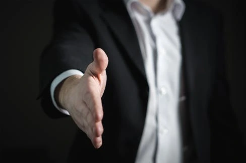 man shaking hands